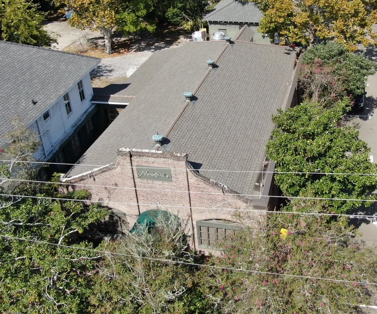 Aerial view of the new roof All Star Roofing installed on Nuvolari's Ristorante in Old Mandeville, Louisiana