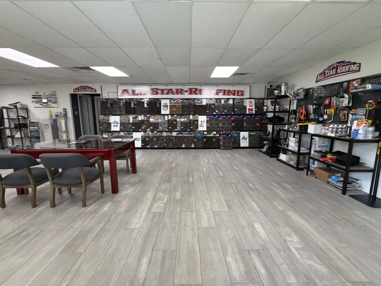 All Star Roofing showroom interior with shingle sample wall in Mandeville Louisiana